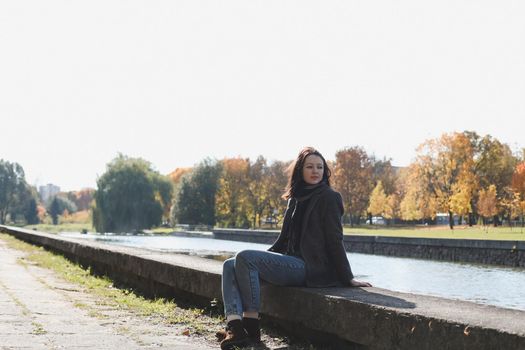 young woman in the autumn park.