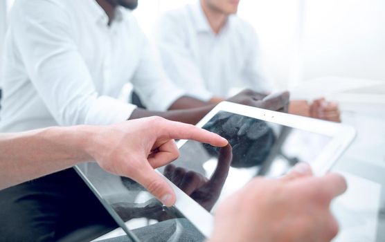 employee using a digital tablet at the workplace.people and technology .