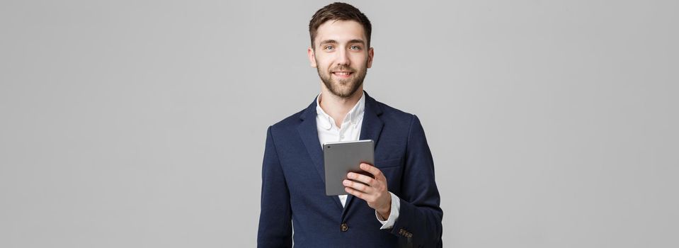 Business Concept - Portrait Handsome Business man playing digital tablet with smiling confident face. White Background. Copy Space.