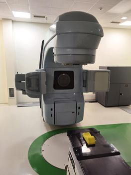 Medical advanced linear accelerator in oncological cancer therapy in a modern hospital. Vertical view