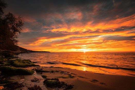 Stunning red sunrise over the sea.