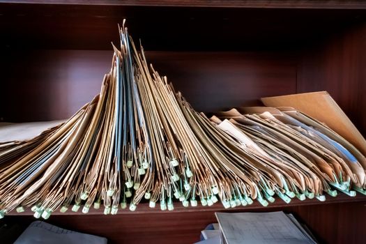 Old folders with documents in the library.