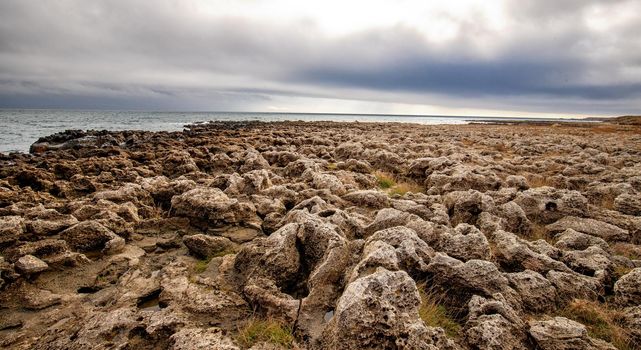 Scenic view to rocks on the seashore