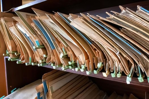 Old folders with documents in the library.