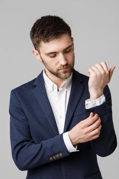 Business Concept - Young successful businessman posing over dark background. Isolated White Background. Copy space.