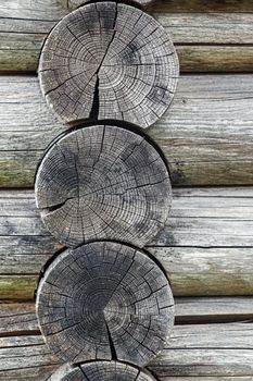 Wooden felling close up. Fragment of old traditional wooden farm house