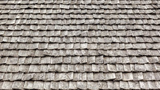 Perspective of old grey brown wooden tile roof background