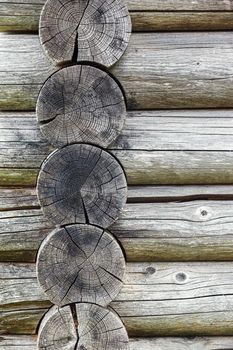 Old Rustic House Architectural Features Hut Built of Wood. Weathered Cracked Wooden Texture close-up