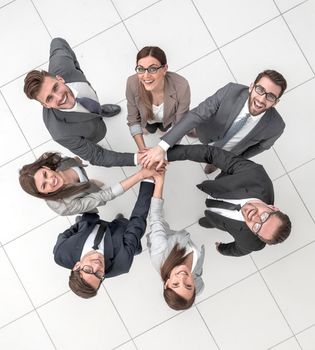 top view.business team standing in a circle.the concept of teamwork