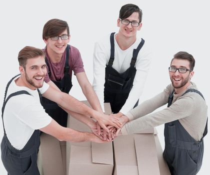 Happy smiling movers carrying boxes, isolated on white background,