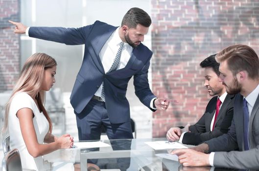 HR Manager talking to employees in the office. business concept