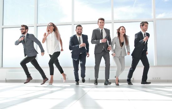 business team in a spacious office hall .photo with copy space