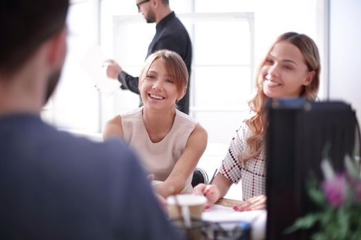 young business woman sitting at office Desk. people and technology