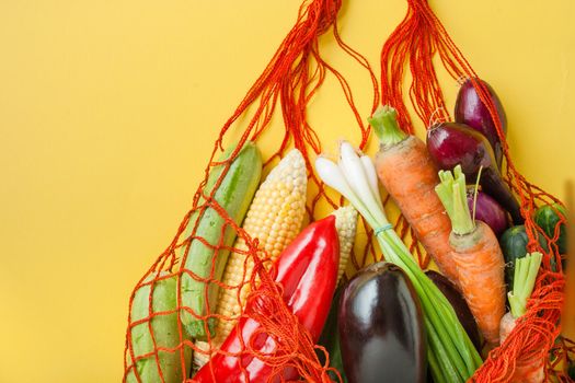 zero waste shopping concept. vegetables in mesh bag without plastic. High quality photo