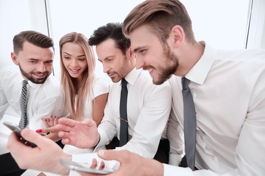 close up.business team using their smartphones.people and technology