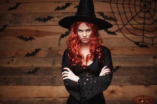 Halloween red hair Witch holding arms posing with angry face