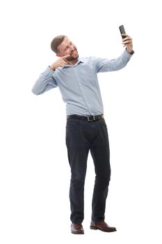 in full growth. happy businessman talking on video link. isolated on white background