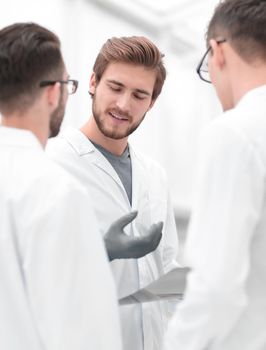 closeup.a group of doctors talking.the concept of teamwork