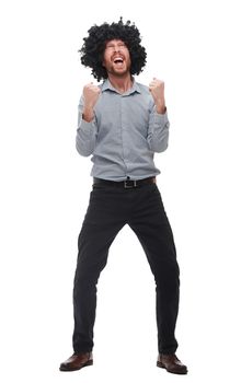 in full growth. a very happy man in a wig . isolated on white background