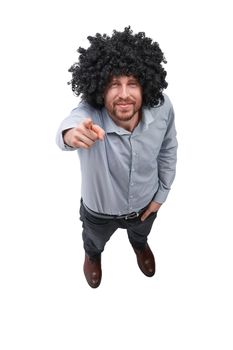 top view. happy man in wig looking at camera . isolated on white background