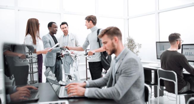 employees working on computers in the office.photo with copy space