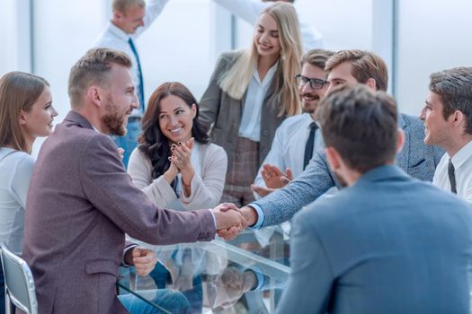 welcome handshake of business people at a meeting in the office . photo with copy space