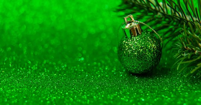 Christmas tree decorations on a shiny background. Vibratory focus. Holiday.
