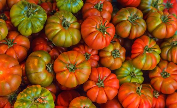 Close-up tomatoes on the market. Selective focus. Food.