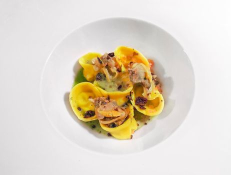 tortellini with fresh fish, salmon and anchovies, Italian recipe