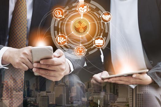 Ripple and cryptocurrency investing concept - Businessman using mobile phone application to trade Ripple XRP with another trader in modern graphic interface. Blockchain and financial technology.