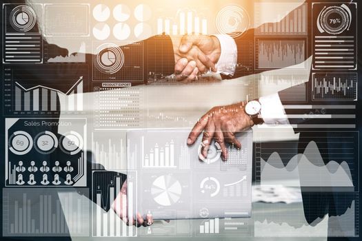 Big Data Technology for Business Finance Analytic Concept. Modern graphic interface shows massive information of business sale report, profit chart and stock market trends analysis on screen monitor.