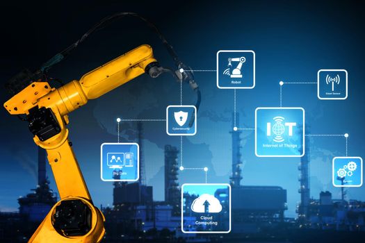 Smart industry robot arms for digital factory production technology showing automation manufacturing process of the Industry 4.0 or 4th industrial revolution and IOT software to control operation .