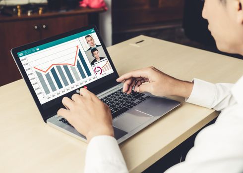 Video call business people meeting on virtual workplace or remote office. Telework conference call using smart video technology to communicate colleague in professional corporate business.