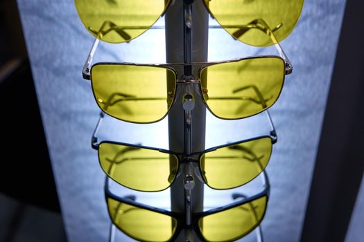 Protective yellow glasses. Sun protection. Different variants.