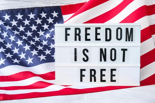 American flag. Lightbox with text FREEDOM IS NOT FREE Flag of the united states of America. July 4th Independence Day. USA patriotism national holiday. Usa proud. Freedom concept