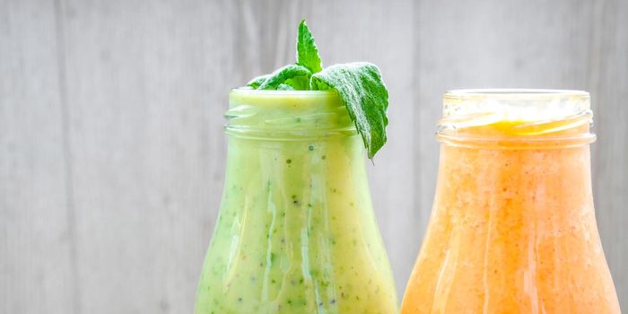 Seasonal Matcha green vegan smoothie with chia seeds and mint pumpkin carrot smoothie drink detox Breakfast. Clean eating, weight loss, healthy dieting food concept Fruit vegetable drink fitness