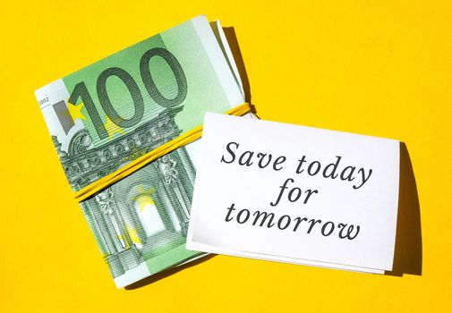 Paper note written text SAVINGS. Save money. Save today for tomorrow Euro banknotes. Money, Business, finance, investment, saving. Cash bill. Business budget of wealth and prosperity finance