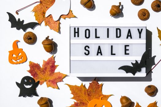 Lightbox with text HOLIDAY SALE, Halloween autumn leaves decorations Sale shopping concept. Online shopping Template Black friday sale mockup fall thanksgiving promotion advertising Big sale. Cyber monday. Holiday