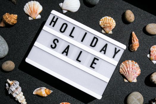 Lightbox with text HOLIDAY SALE, summer decorations Sale shopping concept. Mockup summer promotion advertising. Holiday. Sea shell stars. Online shopping