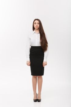 Business Concept - Modern caucasian business woman in the white studio background with copy space.
