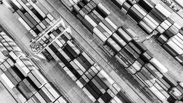 Aerial view of shipping container port terminal. Colourful pattern of containers in harbor. Maritime logistics global inport export trade transportation