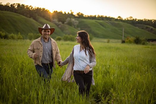 nice portrait of beautiful and young groom and bride outdoors