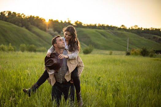 nice portrait of beautiful and young groom and bride outdoors