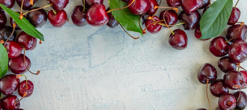 banner with frame of sweet juicy cherries on white textured background. flat laying of ripe cherries. Healthy sweets concept. top view