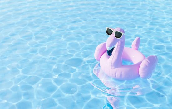 3D illustration of flamingo shape float with stylish sunglasses floating on clean pool water on resort