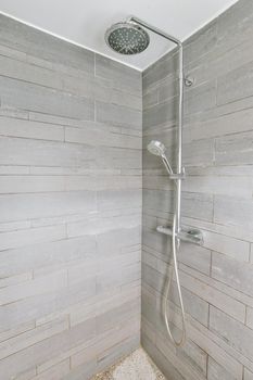 Modern shower stall in a bright bathroom