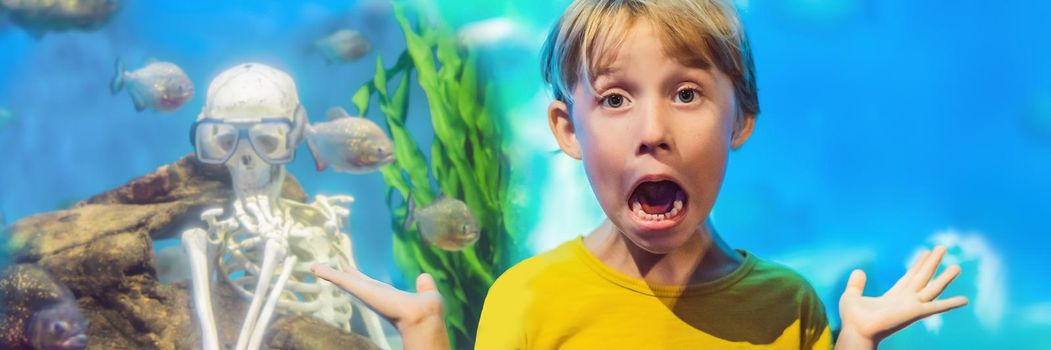 The boy got scared Skeleton and piranha in an aquarium. BANNER, LONG FORMAT