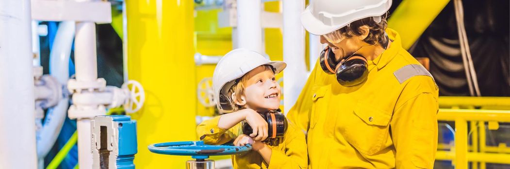 BANNER, LONG FORMAT Young man and a little boy are both in a yellow work uniform, glasses, and helmet in an industrial environment, oil Platform or liquefied gas plant.