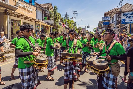 Ubud, Bali, Indonesia - April 22, 2019 : Royal cremation ceremony prepation. Balinese hindus religion procession. Bade and Lembu Black Bull symbol of transportation for the spirit to the heaven.