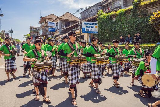 Ubud, Bali, Indonesia - April 22, 2019 : Royal cremation ceremony prepation. Balinese hindus religion procession. Bade and Lembu Black Bull symbol of transportation for the spirit to the heaven.